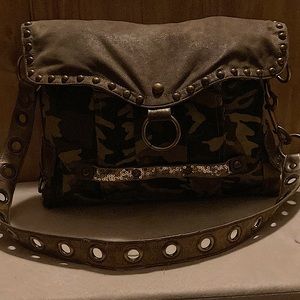 Kathy Van Zeeland shoulder strap purse.